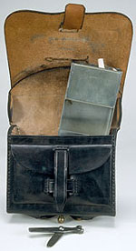 cartridge box open showing musket tool